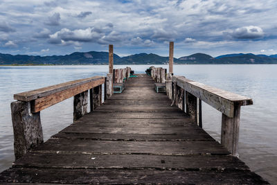 Pier over sea against sky