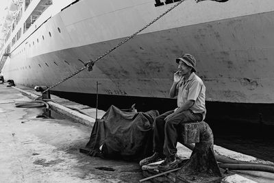 Boats moored at harbor