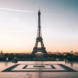 Tower against sky at sunset