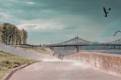 Bridge over river against sky