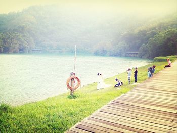 Group of people by the lake