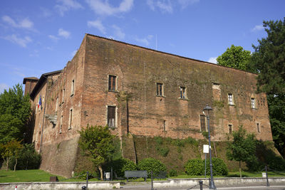 Low angle view of old building against sky