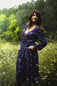 Beautiful woman standing on field