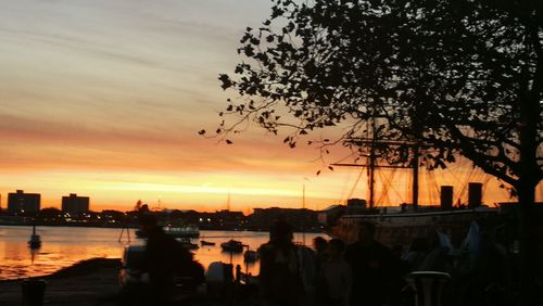 Silhouette of city at sunset