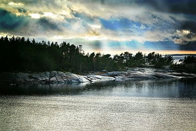 Scenic view of sea against cloudy sky