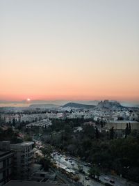 High angle view of townscape against sky during sunset