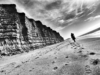 Man standing on rock formation