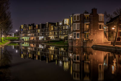 Reflection of houses in canal