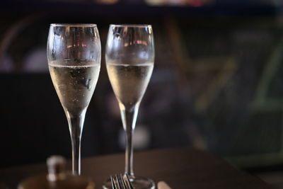 Close-up of wineglass on table