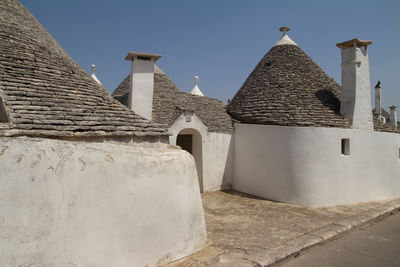 Exterior of historic building against clear sky