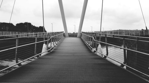 Footbridge with bridge in background