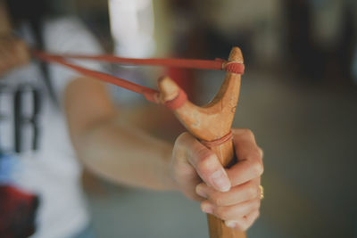 Close-up of hand holding ice cream