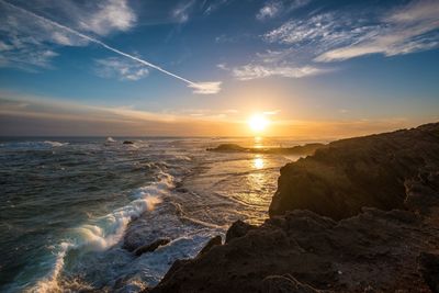 Scenic view of sea against sky during sunset