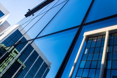 Low angle view of modern building against sky