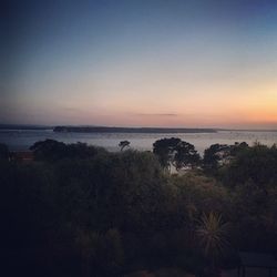 Scenic view of sea at sunset