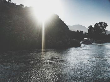 Sun shining over sea