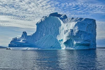 Scenic view of frozen sea against sky