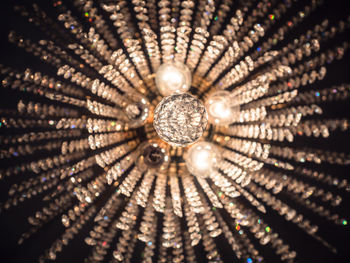 Low angle view of illuminated chandelier