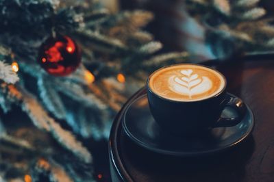 Close-up of cappuccino on table