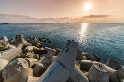 Scenic view of sea against sky during sunset