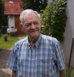 Portrait of smiling mid adult man outdoors