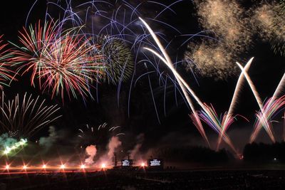 Firework display at night