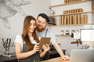 Young couple looking at camera