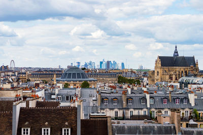 Areal view of the city paris looking toward la defence the business and financial centre of france