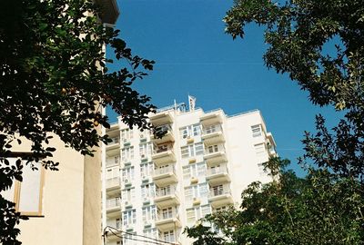 Low angle view of building against blue sky