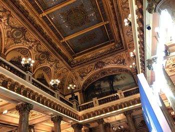 Low angle view of illuminated ceiling of building