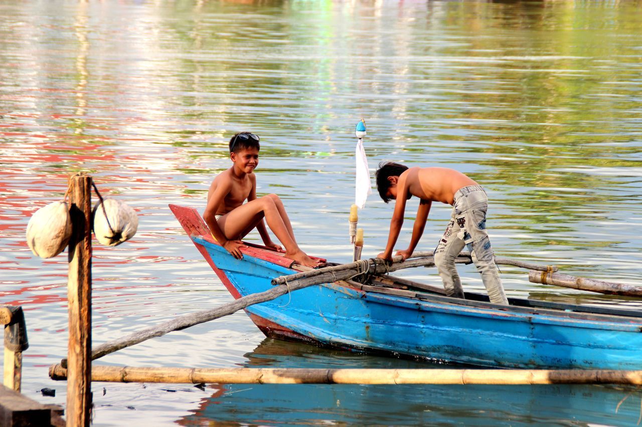 water, lake, swimming, animal themes, nautical vessel, bird, waterfront, animals in the wild, rippled, reflection, boat, wildlife, nature, togetherness, transportation, duck, day, outdoors, oar