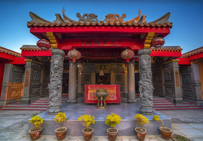 Statue of temple outside building