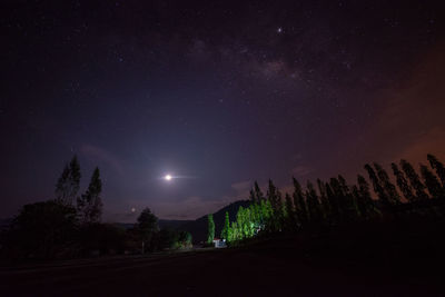 Scenic view of star field against sky at night