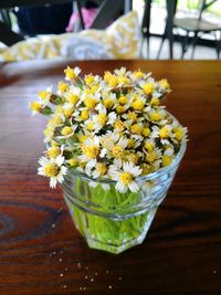 Close-up of white flower vase on table