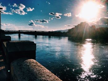 Scenic view of river at sunset