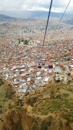 Aerial view of town against sky