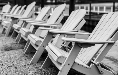 Empty chairs and tables in park