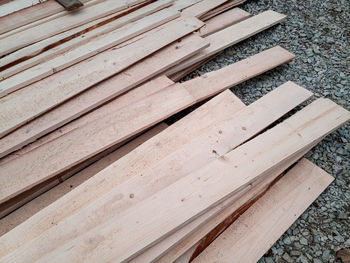 High angle view of wooden bench