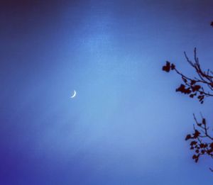 Scenic view of moon against clear blue sky
