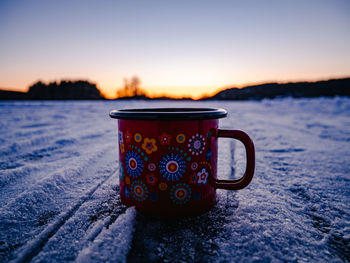 Close-up of coffee on snow