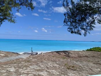 Scenic view of sea against blue sky