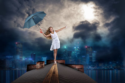 Woman walking on rooftop during storm