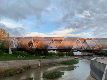 Bridge over river against sky