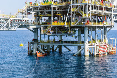 Pier over sea against sky