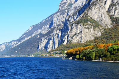 Scenic view of mountains against clear blue sky