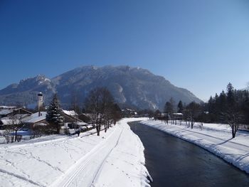 Snow covered mountain against clear sky