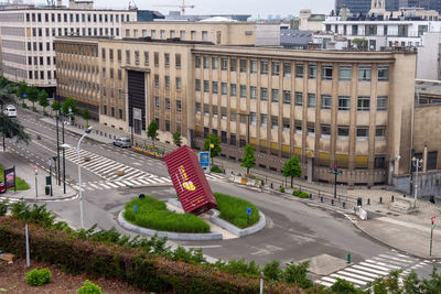 High angle view of road amidst buildings in city