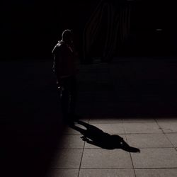 Shadow of woman on wall