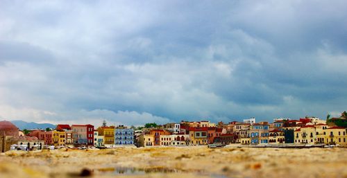 Buildings in city against sky