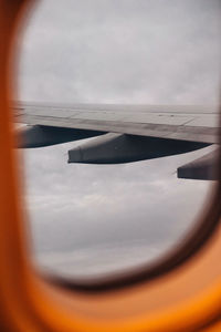Aerial view of sky seen through airplane window